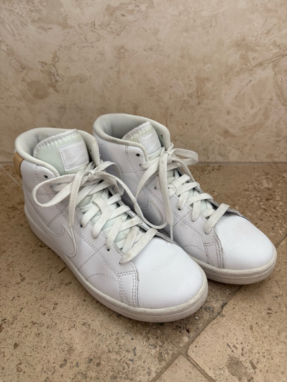 Nike Women’s White Mid-Top Leather Sneakers